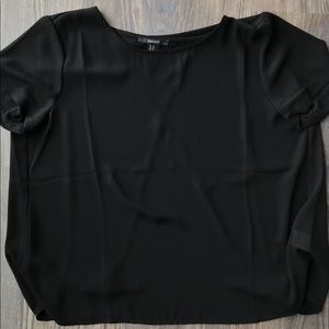 Black contemporary top.